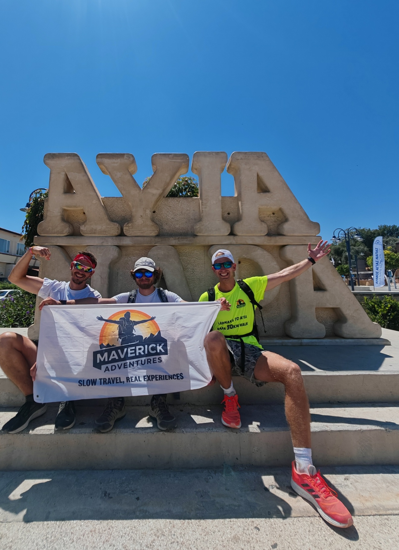 Nenad on the left, Oleg in the middle and Alex on the right celebrating the 50-kilometre walk to Ayia Napa